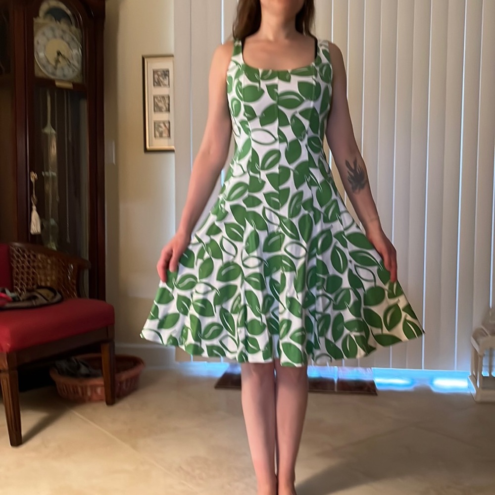 Sleeveless fit and flare in Size 2, wash and wear.